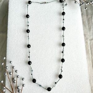 Handmade glass faceted bead and Swarovski crystal hand knotted necklace